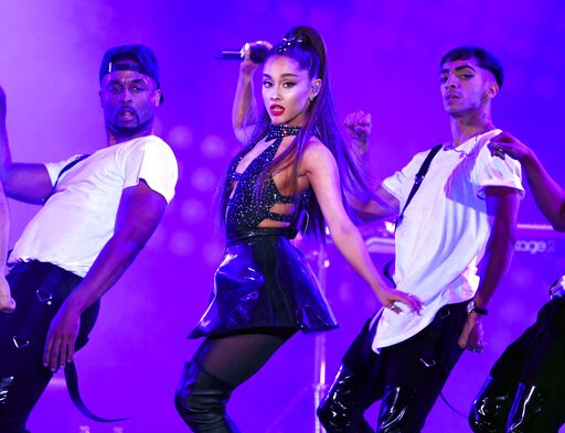 (Photo by Chris Pizzello/Invision/AP, File). FILE - In this June 2, 2018 file photo, Ariana Grande, center, performs at Wango Tango in Los Angeles. Grande won her first Grammy Award on Sunday, Feb. 10, but the singer didn’t collect it after she decided... (Photo by Chris Pizzello/Invision/AP, File). FILE - In this June 2, 2018 file photo, Ariana Grande, center, performs at Wango Tango in Los Angeles. Grande won her first Grammy Award on Sunday, Feb. 10, but the singer didn’t collect it after she decided...