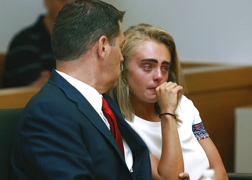 (Matt West/The Boston Herald via AP, Pool, File). FILE - In a Thursday, Aug. 3, 2017 file photo, Michelle Carter awaits her sentencing in a courtroom in Taunton, Mass., for involuntary manslaughter for encouraging Conrad Roy III to kill himself in July... (Matt West/The Boston Herald via AP, Pool, File). FILE - In a Thursday, Aug. 3, 2017 file photo, Michelle Carter awaits her sentencing in a courtroom in Taunton, Mass., for involuntary manslaughter for encouraging Conrad Roy III to kill himself in July...
