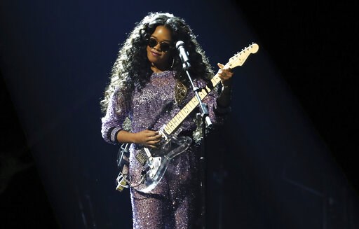 (Photo by Matt Sayles/Invision/AP). H.E.R. performs "Hard Place" at the 61st annual Grammy Awards on Sunday, Feb. 10, 2019, in Los Angeles. (Photo by Matt Sayles/Invision/AP). H.E.R. performs "Hard Place" at the 61st annual Grammy Awards on Sunday, Feb. 10, 2019, in Los Angeles.