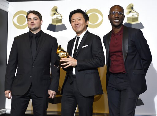 (Photo by Chris Pizzello/Invision/AP). Jason Cole, from left, Hiro Murai and Ibra Ake pose in the press room with the award for best music video for Childish Gambino's "This Is America" at the 61st annual Grammy Awards at the Staples Center on Sunday, ... (Photo by Chris Pizzello/Invision/AP). Jason Cole, from left, Hiro Murai and Ibra Ake pose in the press room with the award for best music video for Childish Gambino's "This Is America" at the 61st annual Grammy Awards at the Staples Center on Sunday, ...