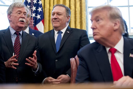 (AP Photo/Andrew Harnik). From left, National Security Adviser John Bolton, accompanied by Secretary of State Mike Pompeo, and President Donald Trump, speaks before Trump signs a National Security Presidential Memorandum to launch the "Women's Global D... (AP Photo/Andrew Harnik). From left, National Security Adviser John Bolton, accompanied by Secretary of State Mike Pompeo, and President Donald Trump, speaks before Trump signs a National Security Presidential Memorandum to launch the "Women's Global D...