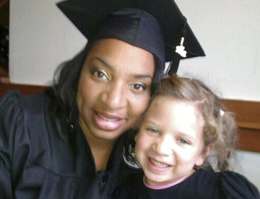 (Amberkatherine DeCory via AP). This undated selfie shows Amberkatherine DeCory with her daughter, Mila DeCory. Until her daughter could speak, Decory, a police officer who lives outside Minneapolis, carried her birth certificate and even a photo of he... (Amberkatherine DeCory via AP). This undated selfie shows Amberkatherine DeCory with her daughter, Mila DeCory. Until her daughter could speak, Decory, a police officer who lives outside Minneapolis, carried her birth certificate and even a photo of he...