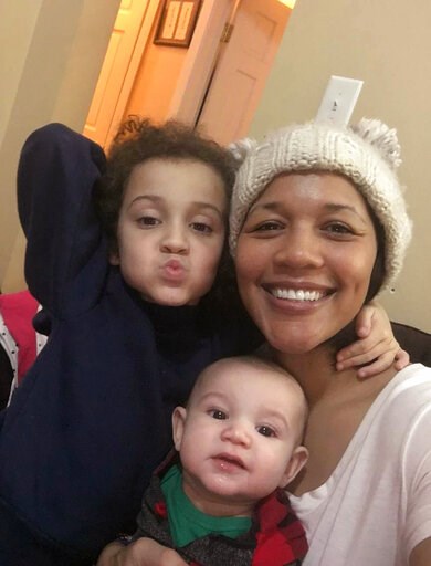 (Cydnee Rafferty via AP). This January 2019 selfie photo released by Cydnee Rafferty shows herself and her two children, Devin, 5, and Leo, 5-months-old, in New York. Rafferty, who is African-American and whose husband is white sends a letter with her ... (Cydnee Rafferty via AP). This January 2019 selfie photo released by Cydnee Rafferty shows herself and her two children, Devin, 5, and Leo, 5-months-old, in New York. Rafferty, who is African-American and whose husband is white sends a letter with her ...