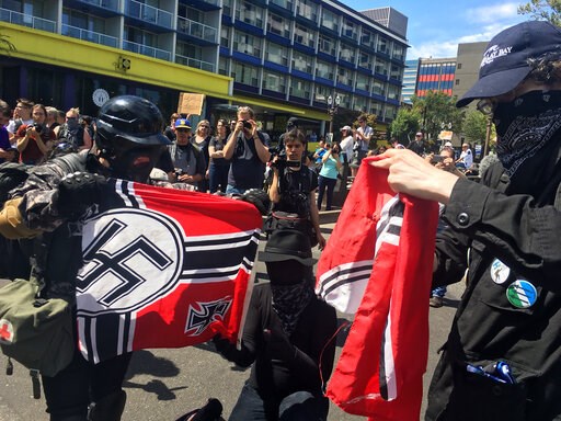 Portland police texts with far-right group spark probe