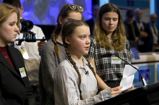 Swedish teen leads Belgian students on 7th climate march