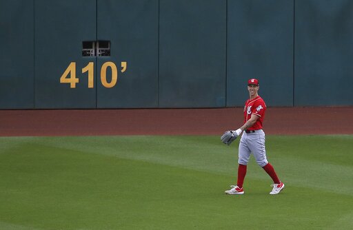 Reds' Lorenzen pitches an inning, moves to center field