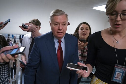 (AP Photo/J. Scott Applewhite). IN this March 13, 2019, photo, reporters pose questions to Sen. Lindsey Graham, R-S.C., at the Capitol in Washington, Wednesday, March 13, 2019. The Republican-led Senate is set to deal President Donald Trump a rebuke on... (AP Photo/J. Scott Applewhite). IN this March 13, 2019, photo, reporters pose questions to Sen. Lindsey Graham, R-S.C., at the Capitol in Washington, Wednesday, March 13, 2019. The Republican-led Senate is set to deal President Donald Trump a rebuke on...