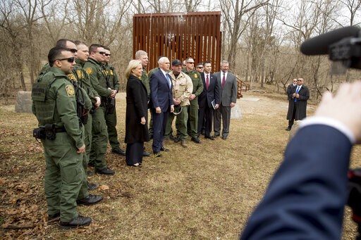 (AP Photo/Andrew Harnik). A section of border wall, used for training, is visible behind Vice President Mike Pence, center, and Homeland Security Secretary Kirstjen Nielsen, center left, as they pose for a photograph with Border Patrol agents following... (AP Photo/Andrew Harnik). A section of border wall, used for training, is visible behind Vice President Mike Pence, center, and Homeland Security Secretary Kirstjen Nielsen, center left, as they pose for a photograph with Border Patrol agents following...