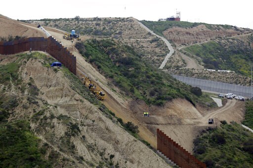 (AP Photo/Gregory Bull). Construction crews replace a section of the primary wall separating San Diego, above right, and Tijuana, Mexico, below left, Monday, March 11, 2019, seen from Tijuana, Mexico. President Donald Trump is reviving his border wall ... (AP Photo/Gregory Bull). Construction crews replace a section of the primary wall separating San Diego, above right, and Tijuana, Mexico, below left, Monday, March 11, 2019, seen from Tijuana, Mexico. President Donald Trump is reviving his border wall ...