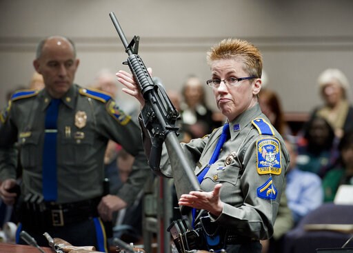 (AP Photo/Jessica Hill, File). FILE - In this Jan. 28, 2013, file photo, firearms training unit Detective Barbara J. Mattson, of the Connecticut State Police, holds a Bushmaster AR-15 rifle, the same make and model used by Adam Lanza in the 2012 Sandy ... (AP Photo/Jessica Hill, File). FILE - In this Jan. 28, 2013, file photo, firearms training unit Detective Barbara J. Mattson, of the Connecticut State Police, holds a Bushmaster AR-15 rifle, the same make and model used by Adam Lanza in the 2012 Sandy ...