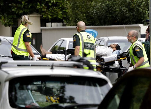 (AP Photo/Mark Baker). Ambulance staff take a man from outside a mosque in central Christchurch, New Zealand, Friday, March 15, 2019. A witness says many people have been killed in a mass shooting at a mosque in the New Zealand city of Christchurch. (AP Photo/Mark Baker). Ambulance staff take a man from outside a mosque in central Christchurch, New Zealand, Friday, March 15, 2019. A witness says many people have been killed in a mass shooting at a mosque in the New Zealand city of Christchurch.
