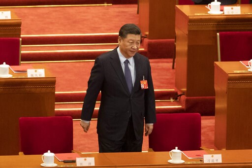 (AP Photo/Ng Han Guan). Chinese President Xi Jinping arrives for the closing session of the National People's Congress in Beijing's Great hall of the People on Friday, March 15, 2019. (AP Photo/Ng Han Guan). Chinese President Xi Jinping arrives for the closing session of the National People's Congress in Beijing's Great hall of the People on Friday, March 15, 2019.