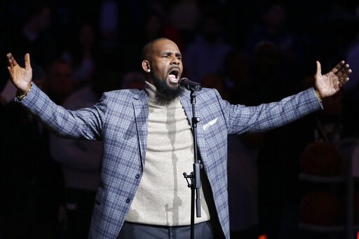 (AP Photo/Frank Franklin II, File). FILE - In this Nov. 17, 2015, file photo, musical artist R. Kelly performs the national anthem before an NBA basketball game between the Brooklyn Nets and the Atlanta Hawks in New York. Sex videos like those that hav... (AP Photo/Frank Franklin II, File). FILE - In this Nov. 17, 2015, file photo, musical artist R. Kelly performs the national anthem before an NBA basketball game between the Brooklyn Nets and the Atlanta Hawks in New York. Sex videos like those that hav...