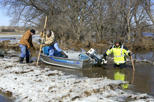 Rescues, evacuations as floodwaters breach levees in Midwest