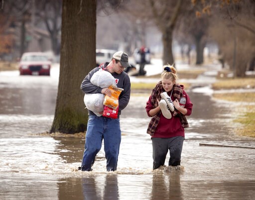 Homes flood as Missouri River overtops, breaches levees