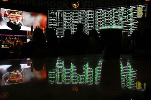 AP-NORC Poll: US divided on college vs pro sports betting