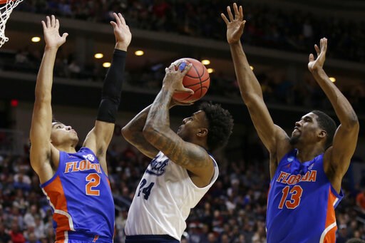 No. 10 seed Florida stops Nevada comeback for 70-61 upset