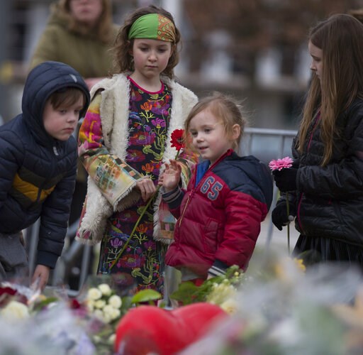 Mourners walk silently to honor Utrecht shooting victims
