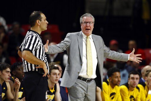 NCAA Latest: Midwest No. 1 Tar Heels rally past 16-seed Iona