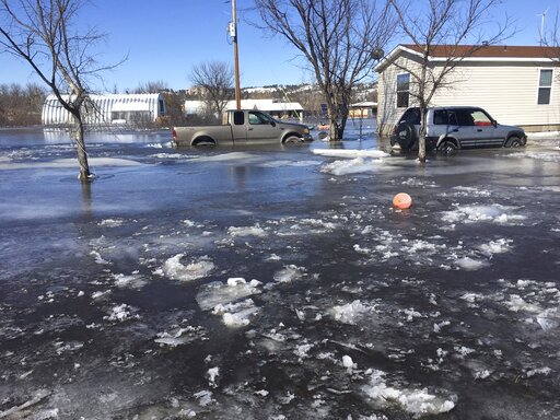 The Latest: Bomb cyclone storm hits US interior