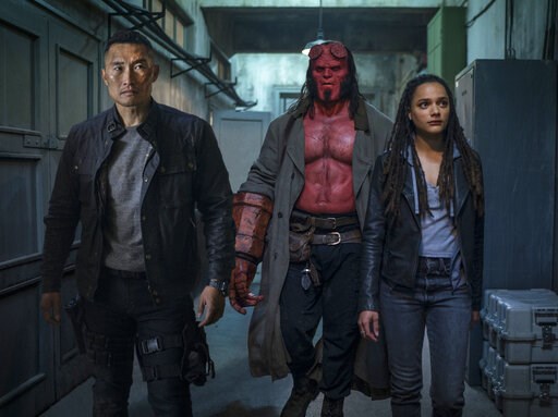 (Mark Rogers/Lionsgate via AP). This image released by Lionsgate shows, from left, Daniel Dae Kim, David Harbour and Sasha Lane in a scene from "Hellboy." (Mark Rogers/Lionsgate via AP). This image released by Lionsgate shows, from left, Daniel Dae Kim, David Harbour and Sasha Lane in a scene from "Hellboy."