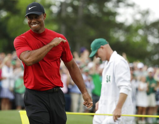 (AP Photo/Chris Carlson). Tiger Woods reacts as he wins the Masters golf tournament Sunday, April 14, 2019, in Augusta, Ga. (AP Photo/Chris Carlson). Tiger Woods reacts as he wins the Masters golf tournament Sunday, April 14, 2019, in Augusta, Ga.