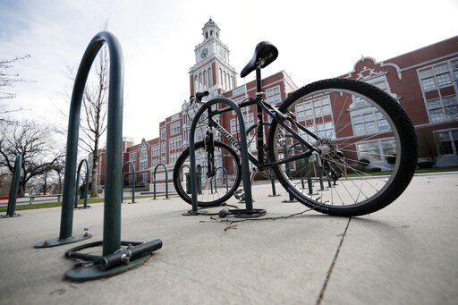 Columbine focuses on healing as questions loom after manhunt