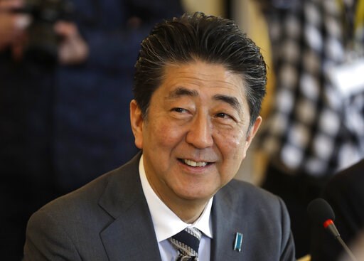 Japan's Abe talks trade with EU chiefs ahead of US visit