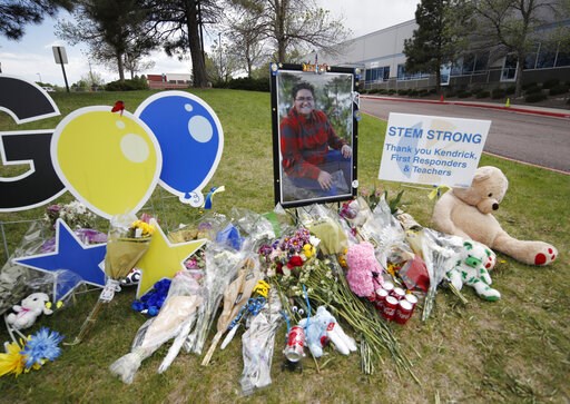 (AP Photo/David Zalubowski). A display grows outside the STEM School Highlands Ranch a week after the attack on the school that left one student dead and others injured, Tuesday, May 14, 2019, in Highlands Ranch, Colo. Student Kendrick Castillo picture... (AP Photo/David Zalubowski). A display grows outside the STEM School Highlands Ranch a week after the attack on the school that left one student dead and others injured, Tuesday, May 14, 2019, in Highlands Ranch, Colo. Student Kendrick Castillo picture...