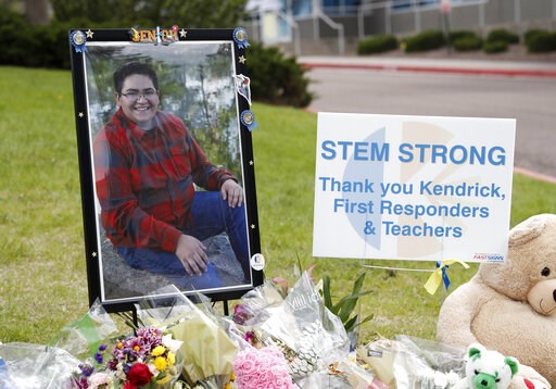 (AP Photo/David Zalubowski). A photograph of student Kendrick Castillo stands amid a display of tributes outside the STEM School Highlands Ranch a week after the attack on the school that left Castillo dead and others injured, Tuesday, May 14, 2019, in... (AP Photo/David Zalubowski). A photograph of student Kendrick Castillo stands amid a display of tributes outside the STEM School Highlands Ranch a week after the attack on the school that left Castillo dead and others injured, Tuesday, May 14, 2019, in...