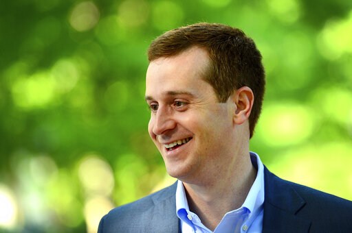 (Jeff Siner/The Charlotte Observer via AP, File). FILE - In this May 8, 2018 file photo Ninth Congressional district Democratic candidate Dan McCready smiles as he speaks with U.S. Rep. Alma Adams outside Eastover Elementary School in Charlotte, N.C. S... (Jeff Siner/The Charlotte Observer via AP, File). FILE - In this May 8, 2018 file photo Ninth Congressional district Democratic candidate Dan McCready smiles as he speaks with U.S. Rep. Alma Adams outside Eastover Elementary School in Charlotte, N.C. S...