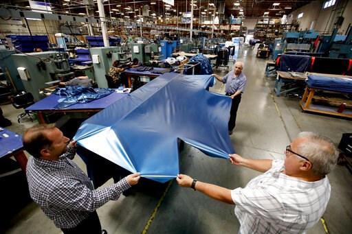 (AP Photo/Chris Carlson, File). FILE - In this July 5, 2018, file photo workers assemble the Afloat water mattresses at the factory in Corona, Calif. On Wednesday, May 15, 2019, the Federal Reserve reports on U.S. industrial production for April. (AP Photo/Chris Carlson, File). FILE - In this July 5, 2018, file photo workers assemble the Afloat water mattresses at the factory in Corona, Calif. On Wednesday, May 15, 2019, the Federal Reserve reports on U.S. industrial production for April.