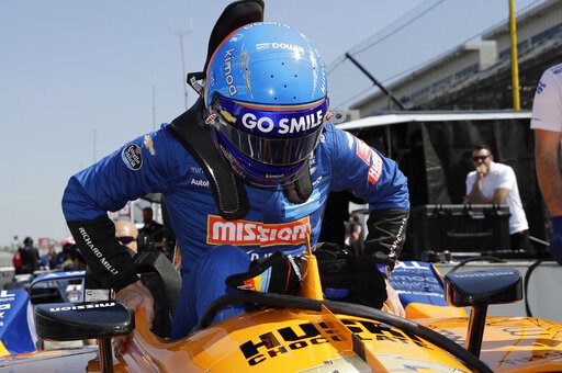 (AP Photo/Darron Cummings). Fernando Alonso, of Spain, climbs into his car to practice for the Indianapolis 500 IndyCar auto race at Indianapolis Motor Speedway, Tuesday, May 14, 2019, in Indianapolis. (AP Photo/Darron Cummings). Fernando Alonso, of Spain, climbs into his car to practice for the Indianapolis 500 IndyCar auto race at Indianapolis Motor Speedway, Tuesday, May 14, 2019, in Indianapolis.