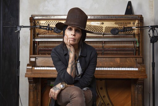 (Photo by Rebecca Cabage/Invision/AP). In this Jan. 23, 2019 photo, Linda Perry poses for a portrait at her studio in Los Angeles. A benefit gala honoring Linda Perry will include a performance by Rock and Roll Hall of Famers Cheap Trick and appearance...
