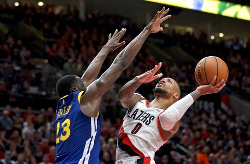 Lillard separated ribs in Game 2 against the Warriors