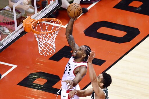 Leonard scores 36, Raptors beat Bucks 118-112 in 2 OTs
