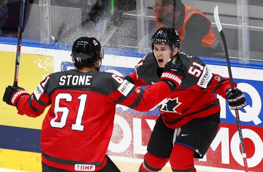 Canada, Finland advance to world hockey title game