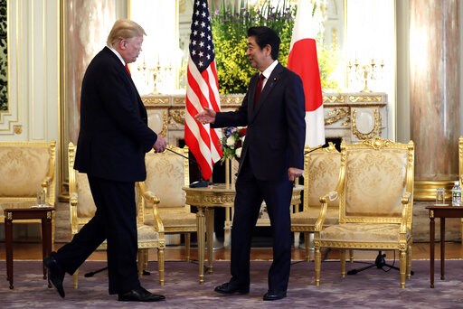 The Latest: Trump, Abe hold talks on North Korea, trade