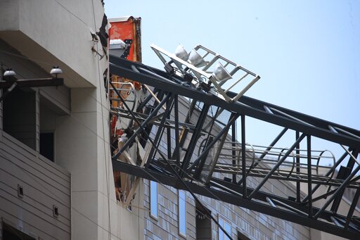 The Latest: Search of accessible apartments finds no victims