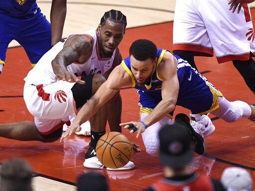 Warriors hang on to stay alive, win Game 5 of NBA Finals