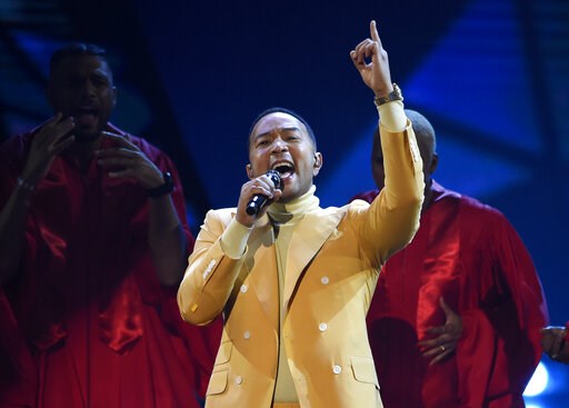 (Photo by Chris Pizzello/Invision/AP, File). FILE - In this March 14, 2019, file photo, John Legend performs "Preach" at the iHeartRadio Music Awards at the Microsoft Theater in Los Angeles. Legend says Hollywood should consider boycotting Georgia, Lou...
