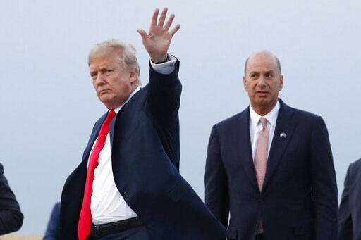 (AP Photo/Pablo Martinez Monsivais, File). FILE - In this July 10, 2018, file photo, President Donald Trump is joined by Gordon Sondland, the U.S. ambassador to the European Union, second from right, as he arrives at Melsbroek Air Base, in Brussels, Be...