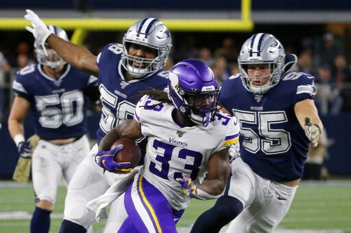 Cook leads Vikings to 28-24 prime-time road win over Cowboys