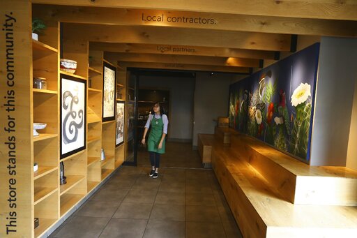 Starbucks, home of the $4 latte, is moving into poor areas