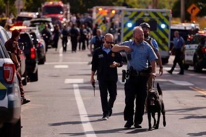 A shooting at a Minneapolis Catholic school kills 2 children, injures 17 people